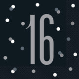 Black napkin with silver number '16' and confetti dots on a black background