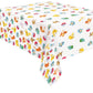 Table covere with Pokemon  cartoon character pattern on a white background
