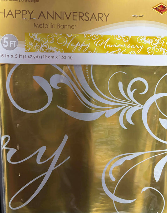 Gold metallic banner with 'Happy Anniversary' text and decorative patterns on packaging.
