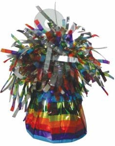Rainbow foil balloon weight with multicolored tinsel decorations.