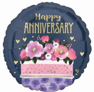 Anniversary balloon with floral design and gold accents for celebration.
