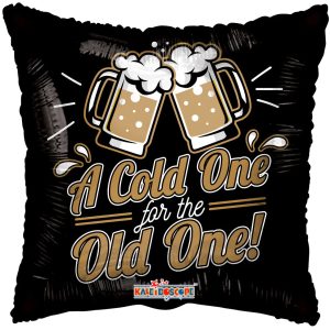 Decorative pillow with beer mugs and text 'A Cold One for the Old One' on a black background.