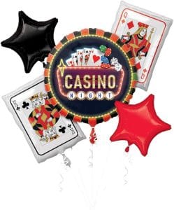 Casino night themed balloon bouquet with playing cards and stars.