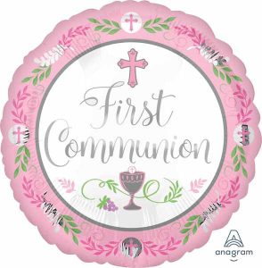 Pink first communion balloon with cross and floral design for celebration.