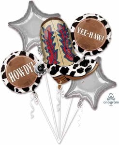 Cowboy-themed balloon bouquet with stars and cowboy sayings.