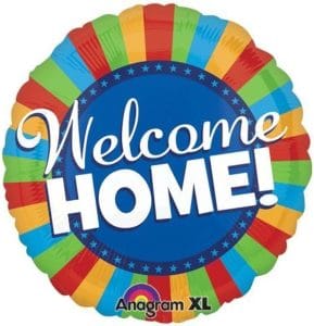 Colorful Welcome Home balloon with rainbow border for celebrations.